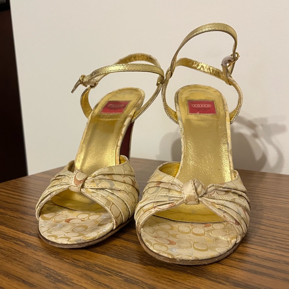 Strappy gold Coach sandals